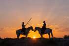 Provence-Alpes-Cote dAzur-France Man and a woman on horseback at sunrise Art Print
